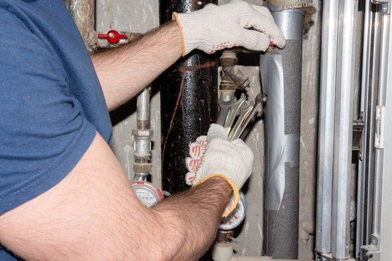 Plumber Fixing a Leak